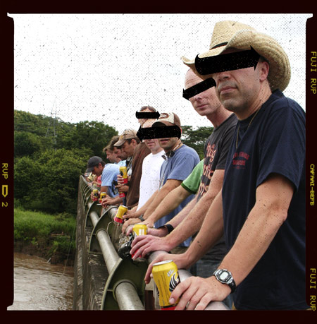 The original line up boys overlooking a bunch of bigass crocoodiles on a bridge somewhere secret