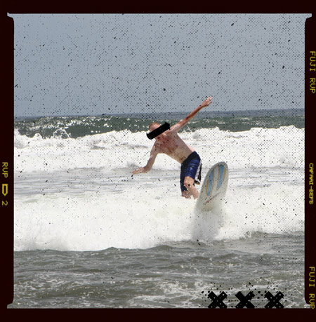 Photo of a dude surfing