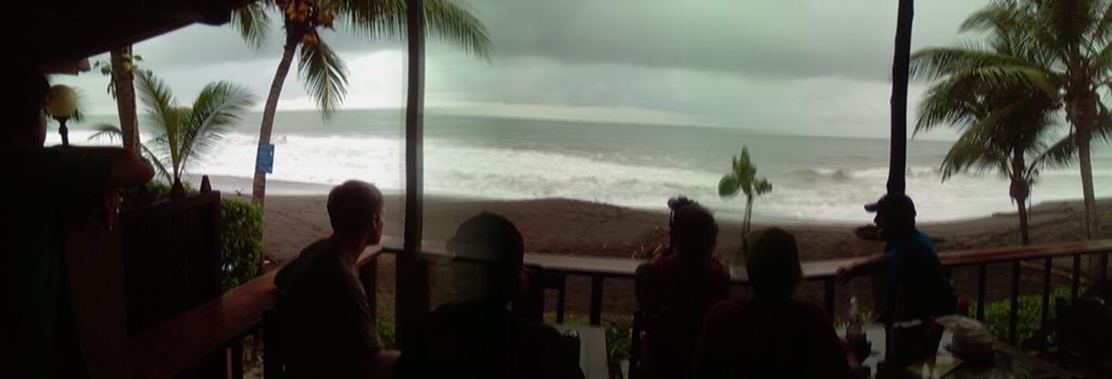 Photo of the ocean taken from a beach bar