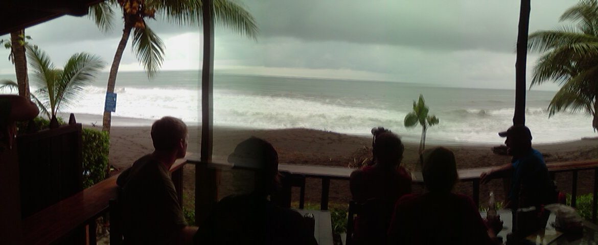 Photo of the ocean taken from a beach bar