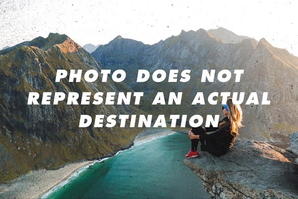 Photo of a woman sitting on a cliff