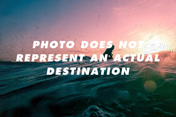 Photo of a man surfing with the words "Photo Does Not Represent an Actual Destination" on it